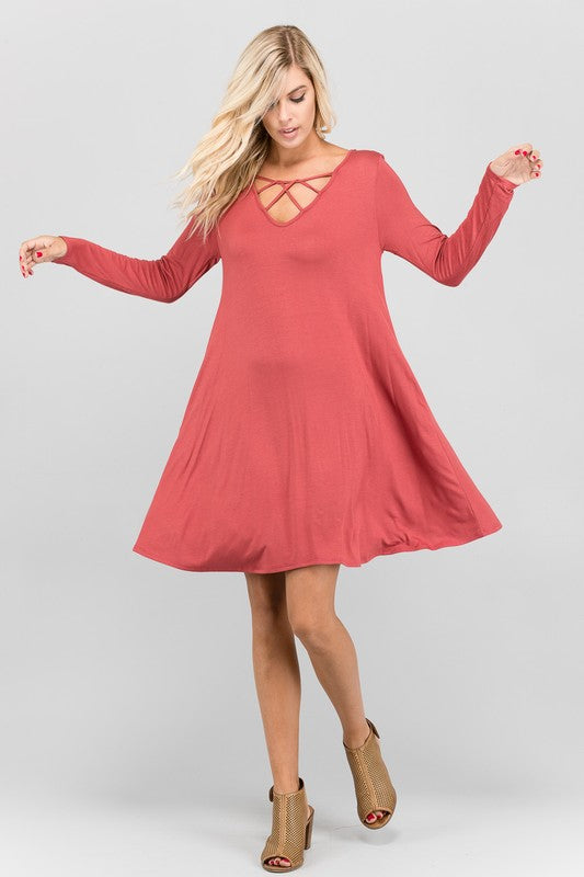 tunic dress with criss cross detail at neckline