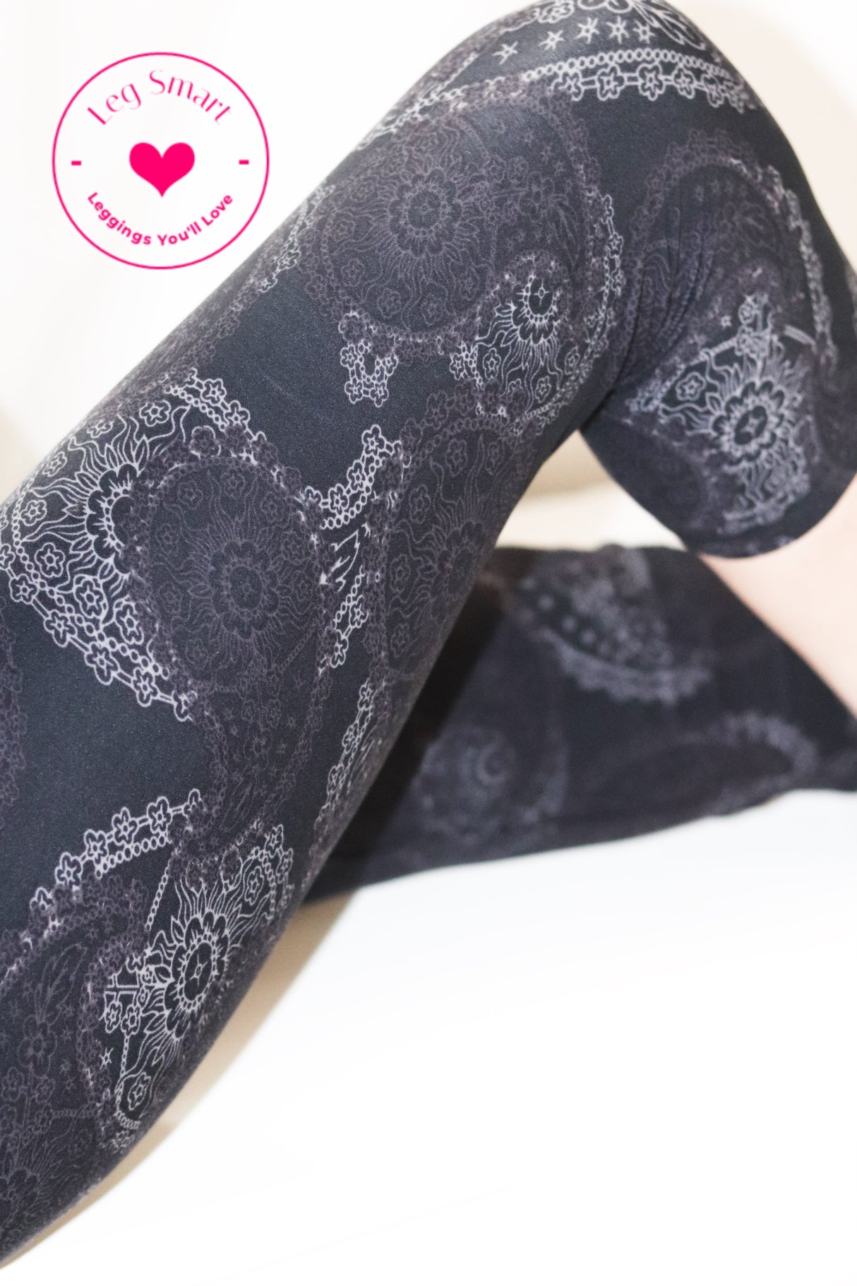 buttery soft black capri leggings with a subtle paisley print