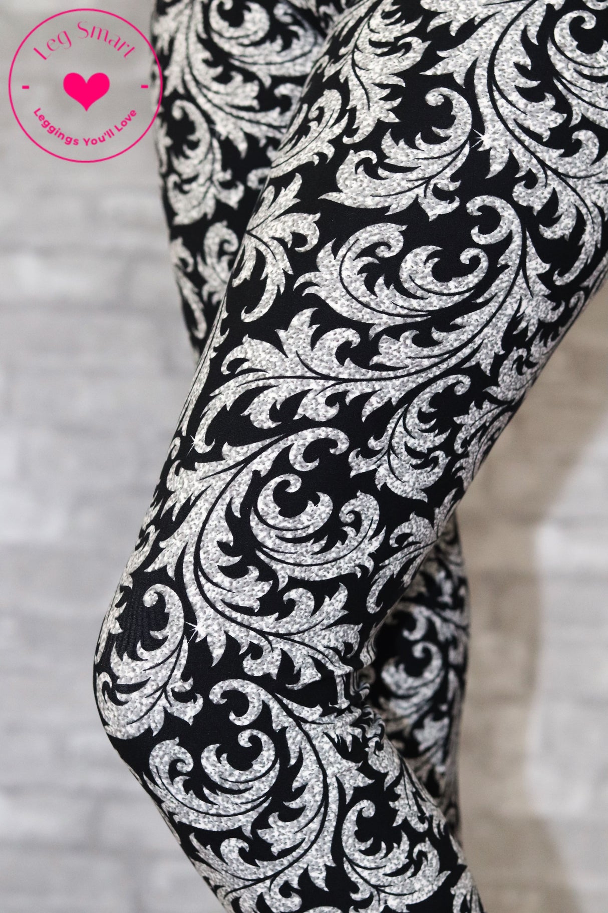 Black capri leggings with a concrete grey printed pattern