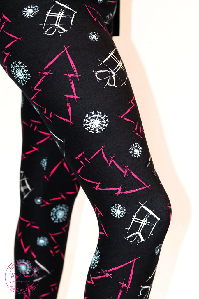 black leggings printed with white presents and ruby Christmas trees