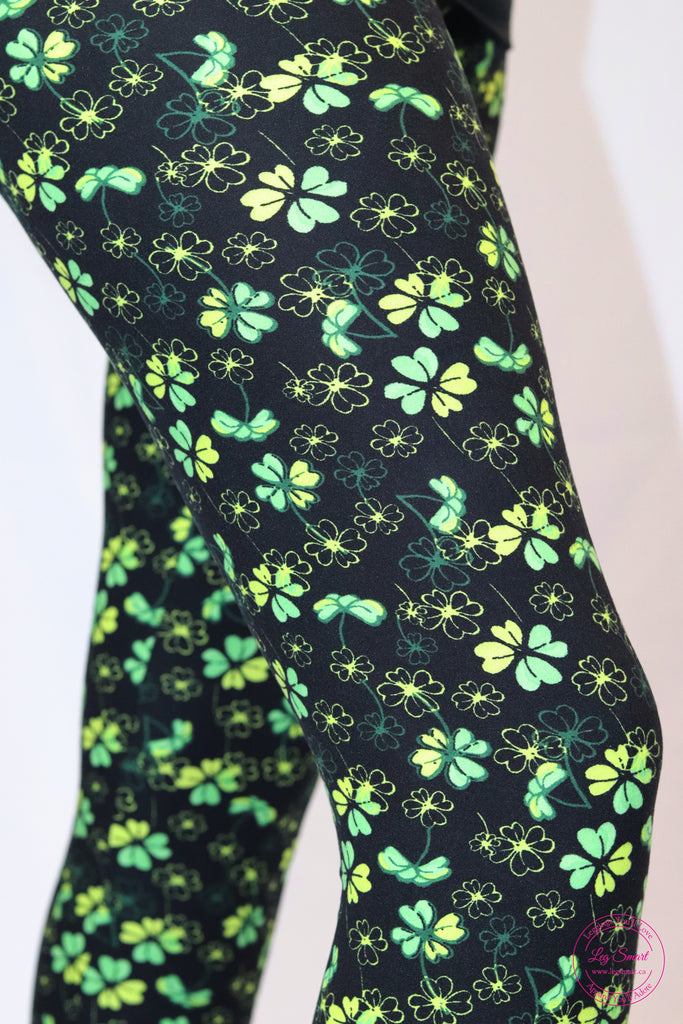 black leggings printed with a green clover print that's perfect for St. Patrick's Day or anyday