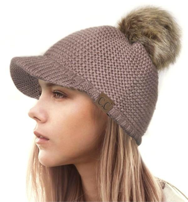 CC Hat with a brim and fur pom pom