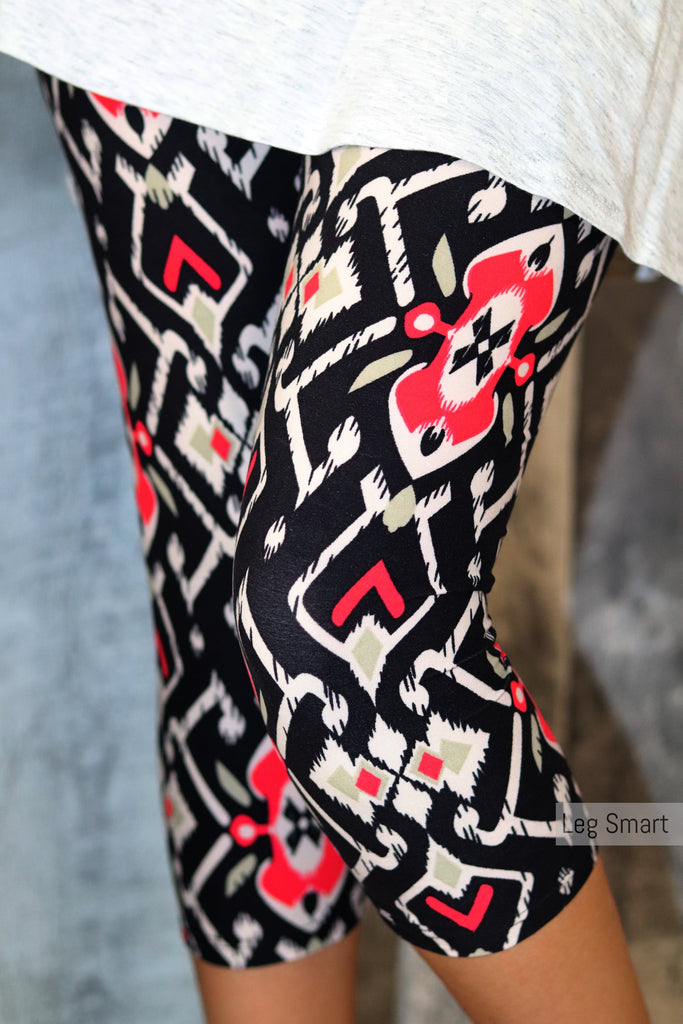 black and white capri leggings with a hint of red