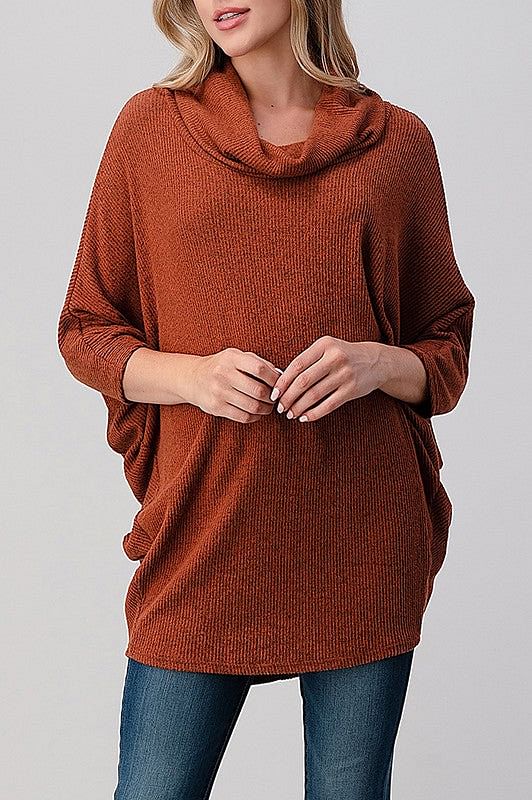 Copper coloured pullover sweater with a cowl neck
