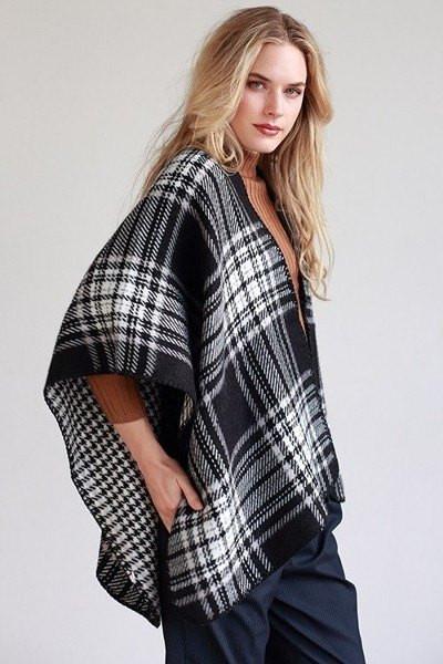 black and white shawl with tarton print on one side and houndstooth on the reverse