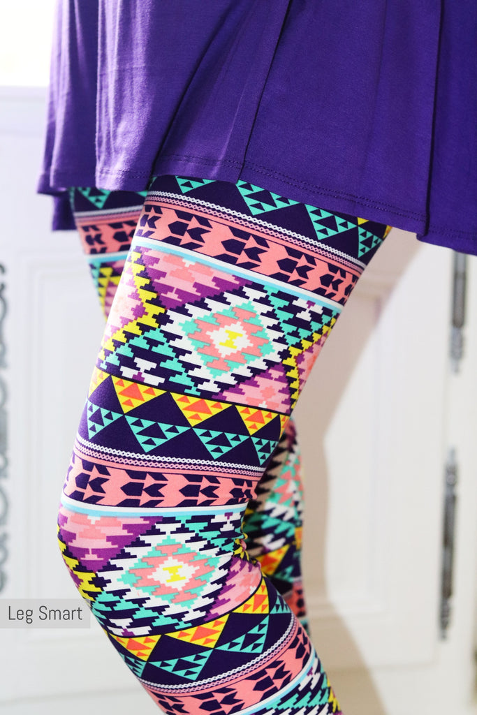aztec print capri leggings with a mix of pink, teal and purple