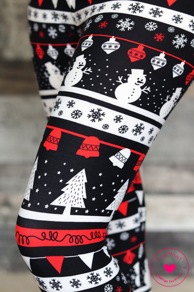 black leggings with red and white printed snowmen, Christmas trees, snowflakes, and ornaments