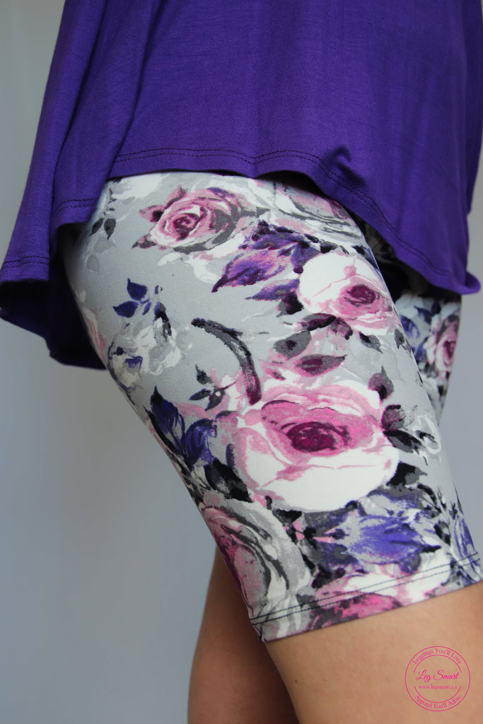 grey shorts with a rose floral print