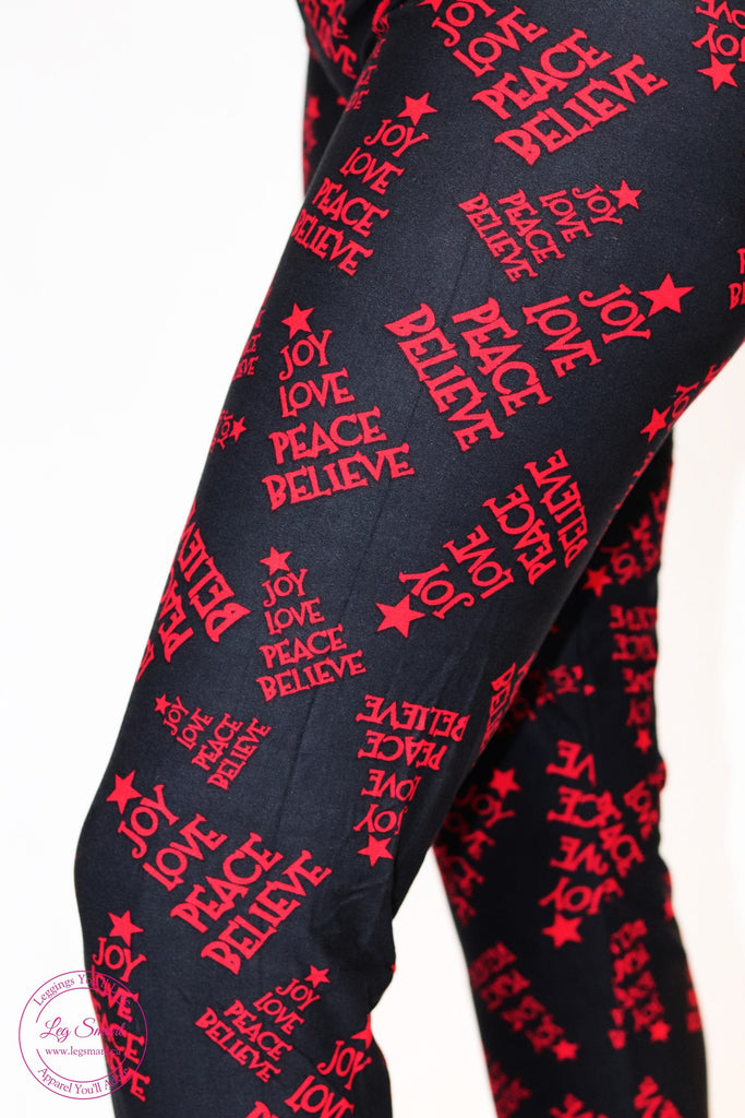 black leggings with joy, love, peace and believe written in a rich red colour