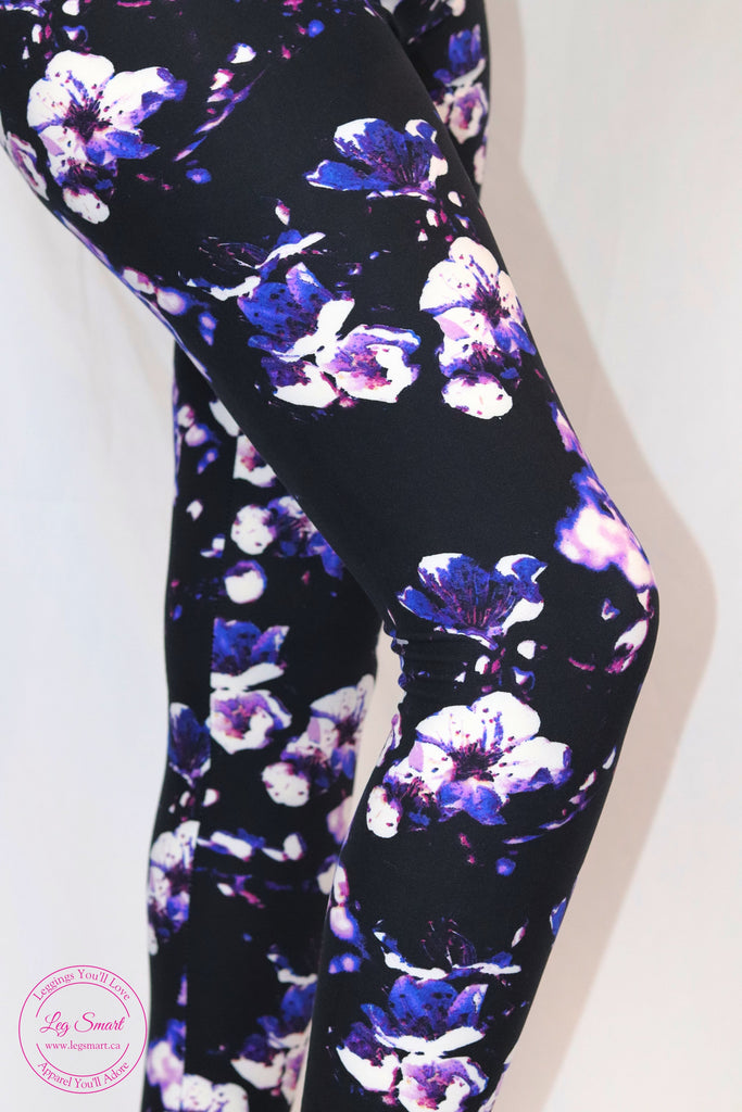 Buttery soft black yoga band leggings with a lavender and white floral print