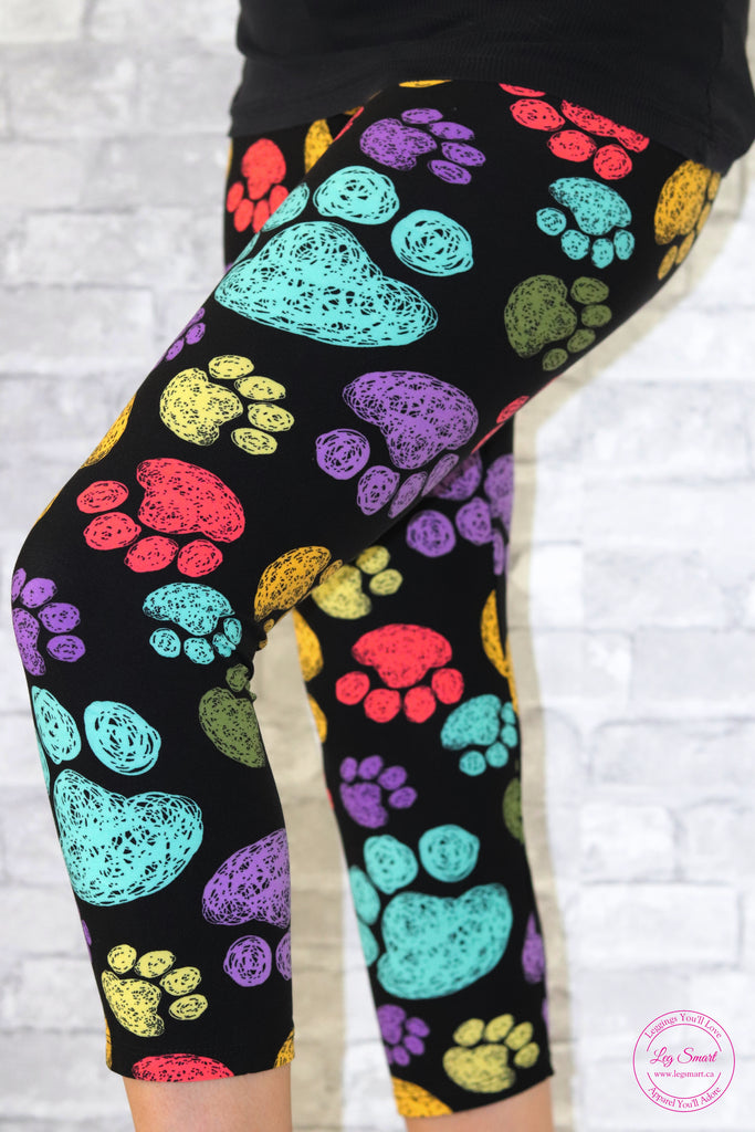 black capri leggings with colourful paw prints