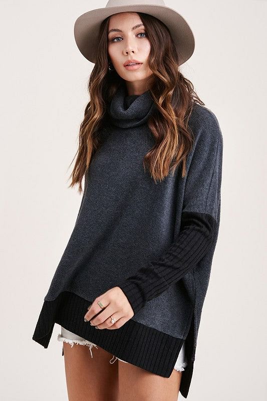 Charcoal grey sweater with contrasting black knit on sleeve and hemline