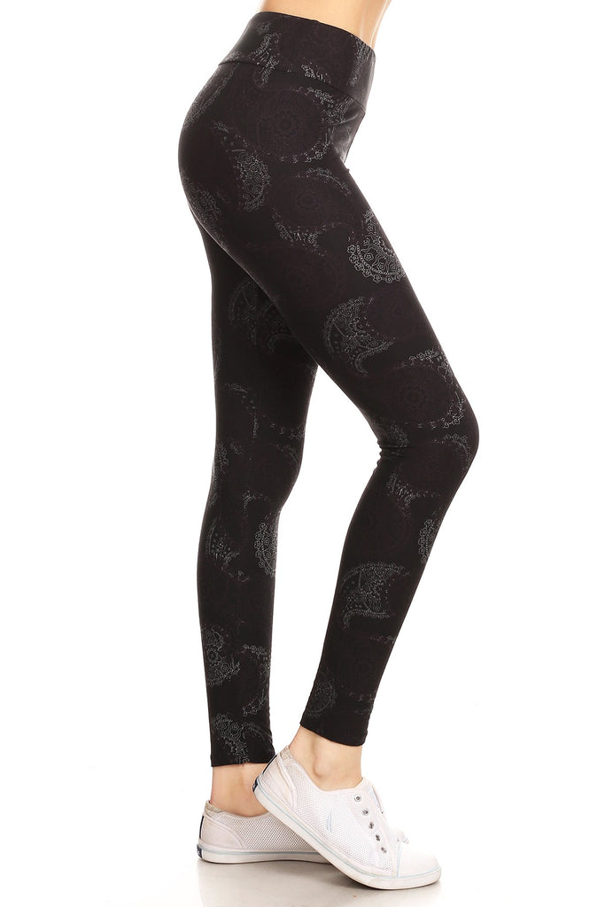 black leggings with light paisley print