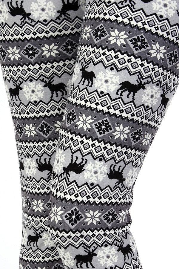 grey Christmas leggings with black and white snowflakes and reindeer