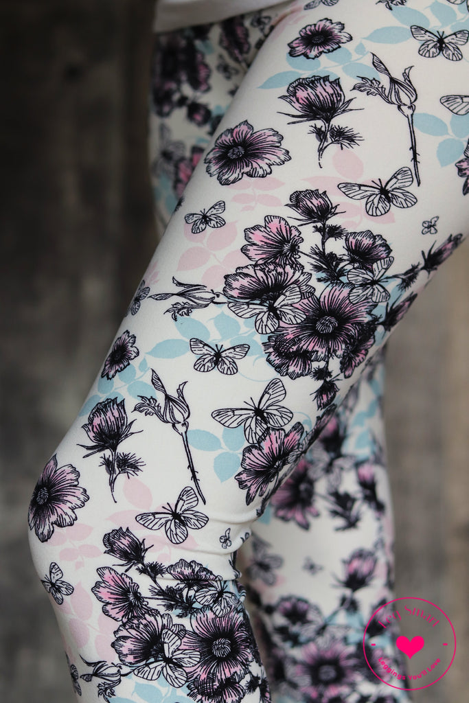 white capri leggings with butterflies and flowers